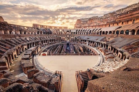 Interior view of the Colosseum in Rome with Arena floor and ancient seating tiers of the amphitheater