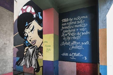 Trullo Photo Tour: popular art and poetry on the walls of a neighborhood