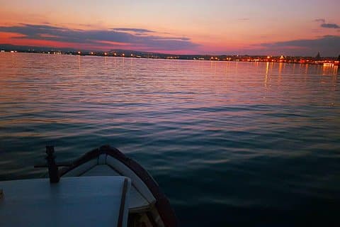 Sunset boat tour with aperitif and swimming break