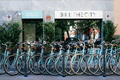 Our venue in Ticinese district and our aquamarine bicycles