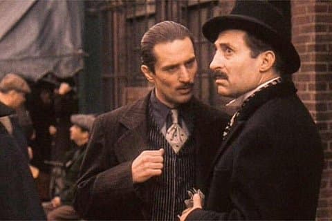 Young Vito Corleone played by Robert De Niro