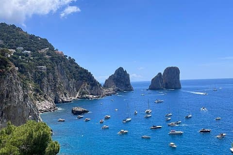 The worldwide known Faraglioni rocks, a mandatory stop in each of our tours.