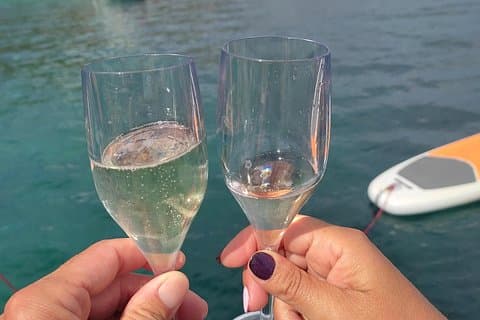 Sunset aperitif on a sailing boat in Alghero