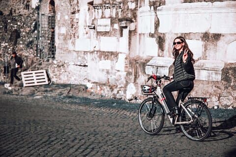 "Pedaling through history with a smile! ‍♀️✨ This stunning ride under the Mausoleum of Cecilia Metella is just one of the many unforgettable moments on our e-bike tour with Rome in a Day Tours!