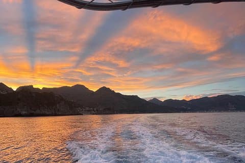 Sunset boat excursion in Taormina