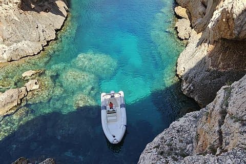 Baunei Coast Boat Tour from Arbatax – Small Group & Swim in Caves