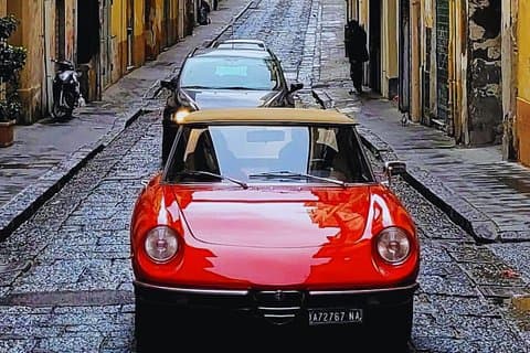Experience Naples in style aboard a vintage Fiat 500. Cruise through scenic streets and enjoy breathtaking views of the coastline
