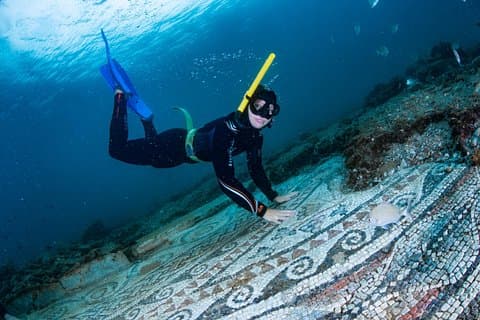 Snorkeling among the Submerged Archaeological Finds of Baia da Napoli