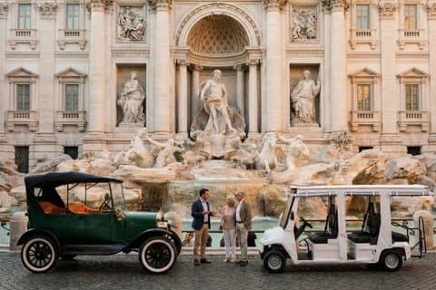 model t electrical golf cart and modern golf cart at trevi fountain