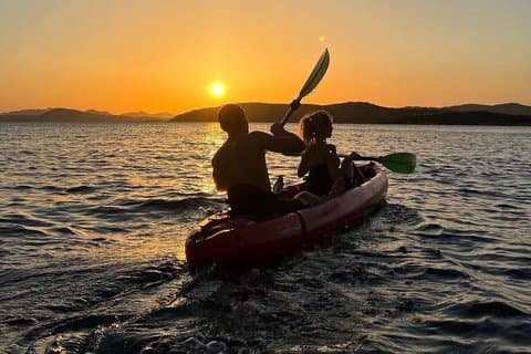 Sunset Kayak Tour with Snorkeling and Local Aperitif