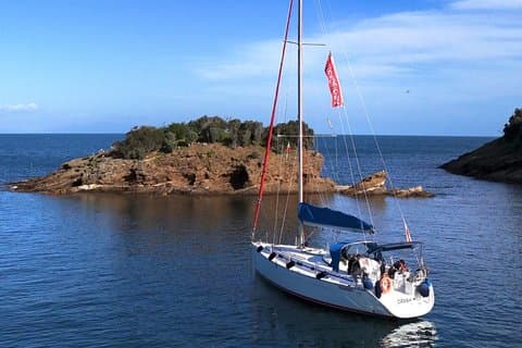 Golfo Aranci tour 3h private sailboat dolphins and aperitif