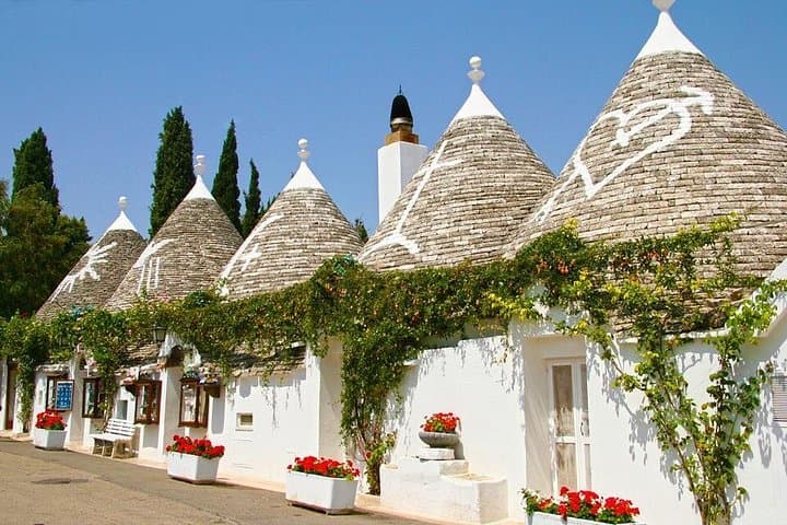 Full-day tour Alberobello & Locorotondo & Polignano a Mare & Bari