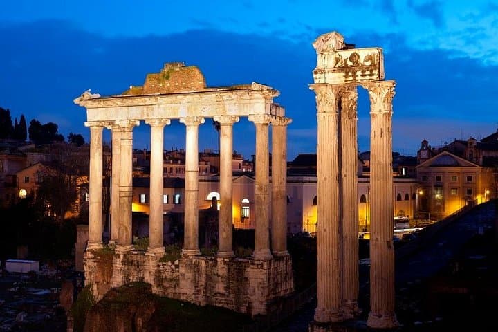 Enjoy the view of the Roman Forum illuminated at night!