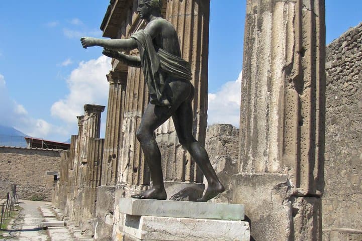 Admire the statue of Apollo on your tour of Pompeii