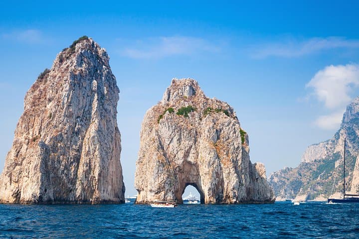 Cruise right through the hole in the Faraglioni rocks