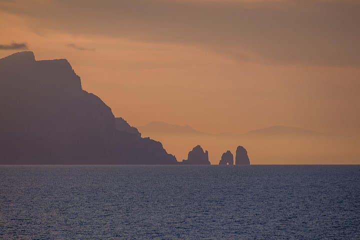 Spot Capri and the Faraglioni in the distance