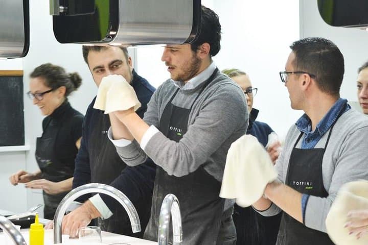 Knead the pizza