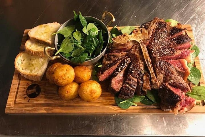 Tuscan Steak served with traditional sides!