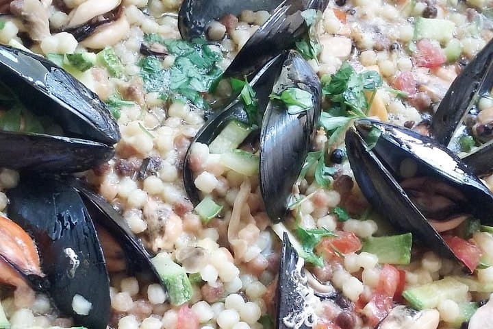 Sardinian Fregola with mussels, clams and cockles.