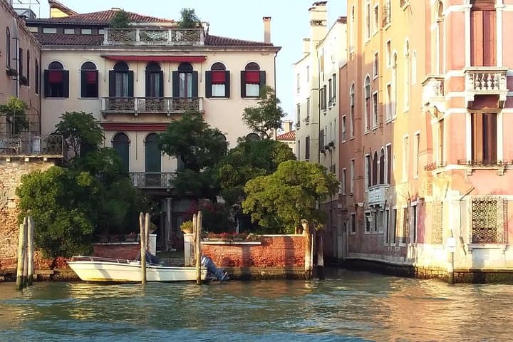 Grand Canal boat tour and Murano glass experience with Hotel pick up