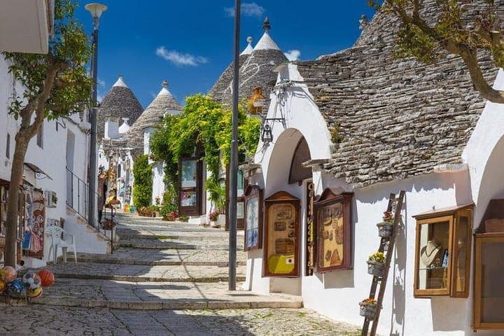 Full-day tour Alberobello & Locorotondo & Polignano a Mare & Bari