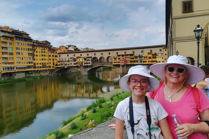 Mum and daughter having fun by Ponte Vecchio