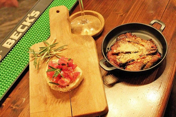 Bruschetta, eggplant parmigiana and rosé wine