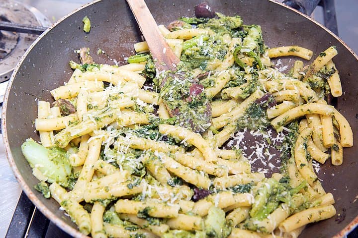 Mixing Pasta with the sauce