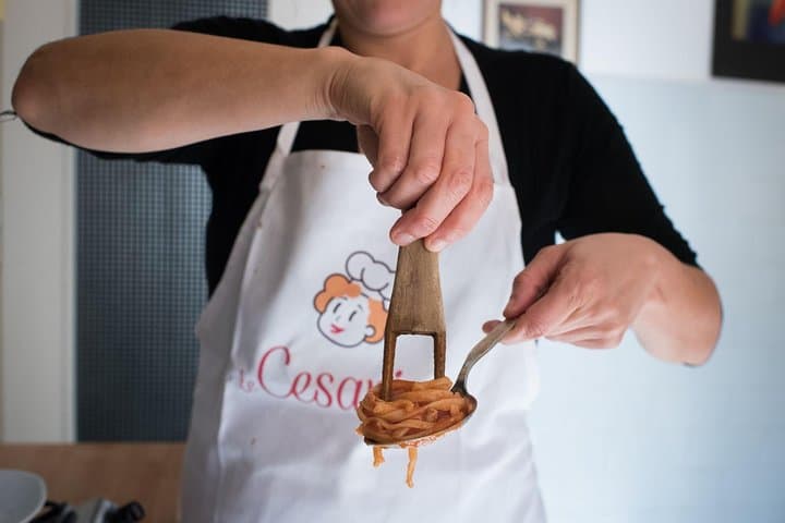 Dining experience at a local's home in Civitavecchia with show cooking