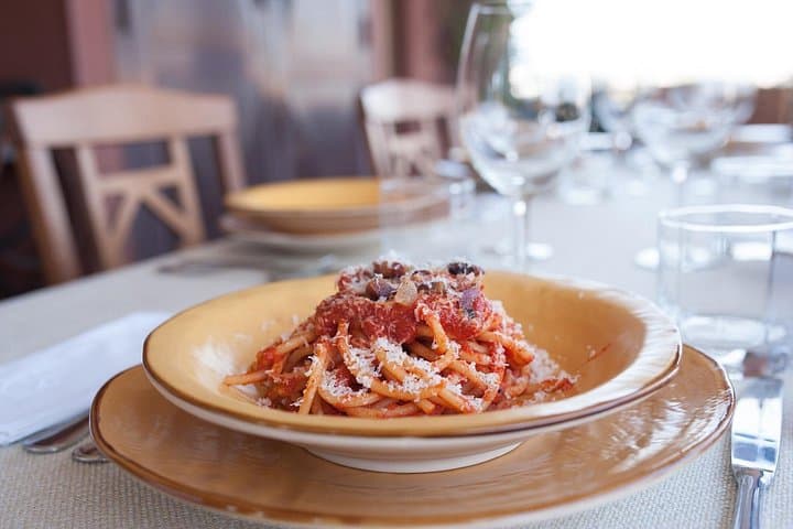 Dining experience at a local's home in Civitavecchia with show cooking