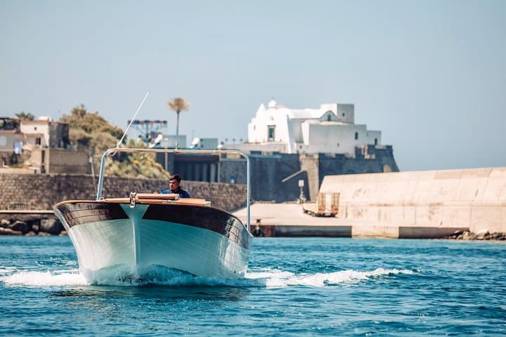 Boat tour of the island of Ischia with a typical Ischia 10-metre launch full day