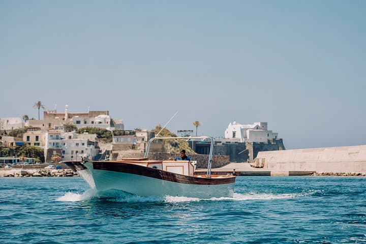 Boat tour of the island of Ischia with a typical Ischia 10-metre launch full day