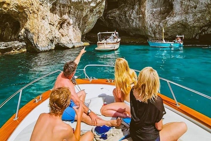 Capri Boat tour with Shttps://media-cdn.tripadvisor.com/media/attractions-splice-spp-720x480/0a/4f/68/20.jpgorrento Trips