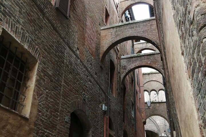 Medieval alley with arches