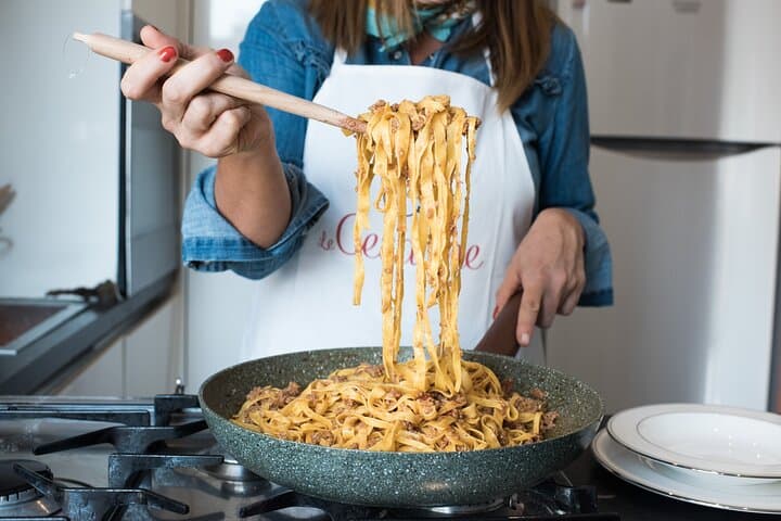 Tagliatelle with meat or tomato sauce