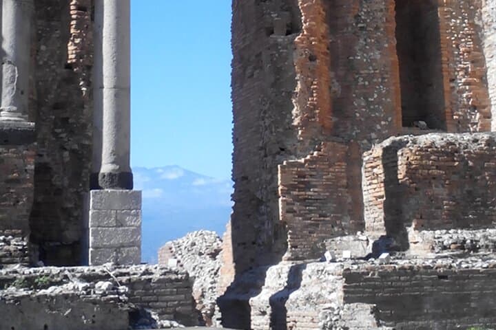 Mount Etna through an arch