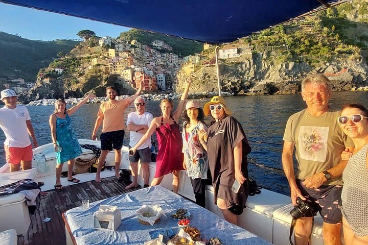 Sunset private boat tour of Cinque Terre with traditional ligurian gozzo