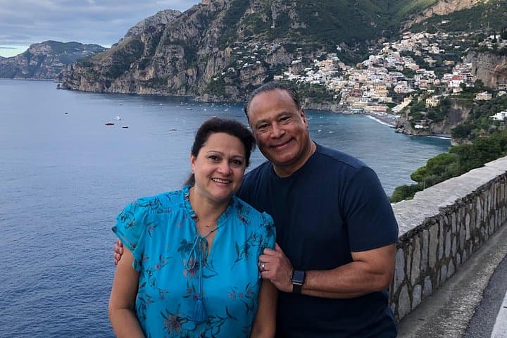 Romantic couple and Positano in the background