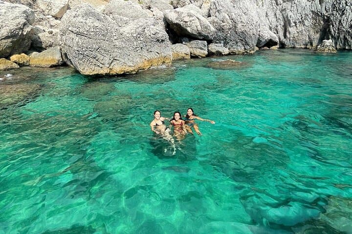 Snorkel and swim in hidden Capri grottos.