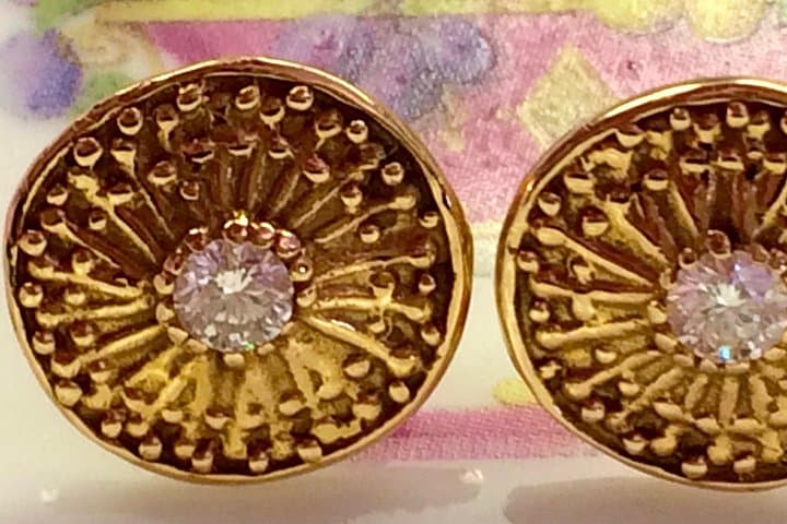 Etruscan inspired earrings with diamonds.