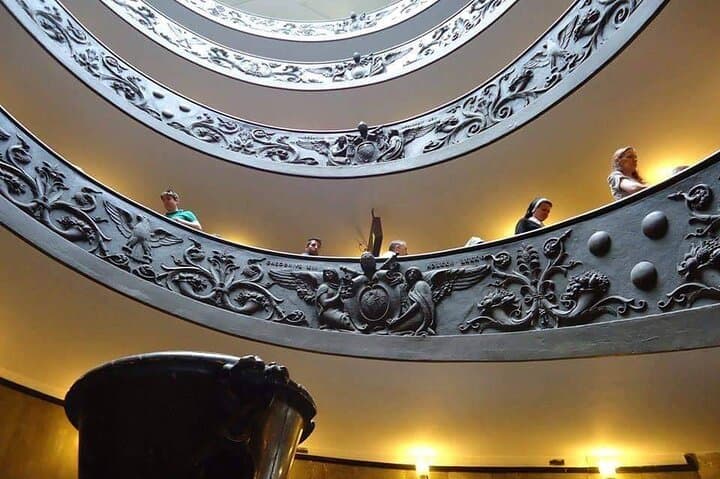 “The famous Vatican Museums spiral staircase – a must-see architectural masterpiece.”