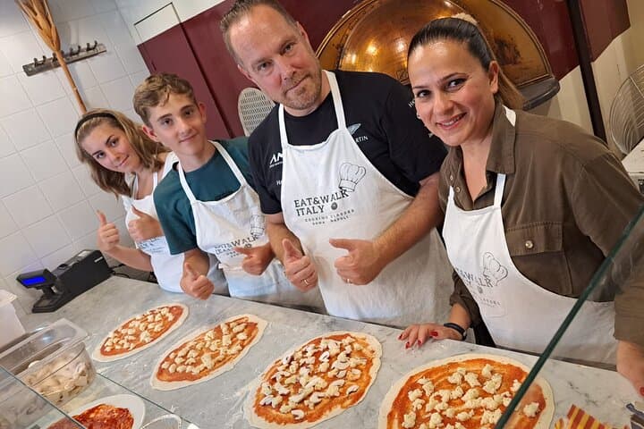 Happy family at our pizza-making class.