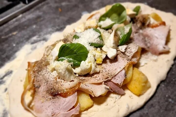 Pizza baked potatoes and porchetta