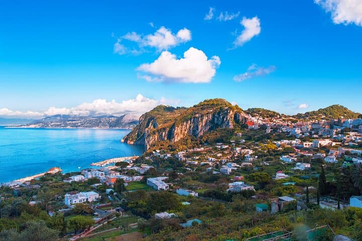 Capri Guided Boat Experience with Island Exploration and Transfer