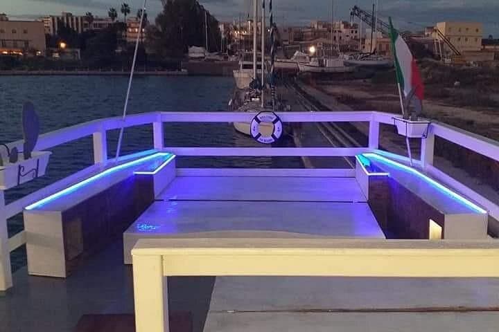 Sunset boat tour with aperitif and swimming break