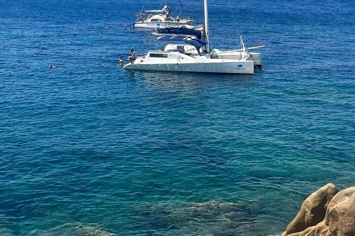 Daily cruise on a sailing catamaran on the La Maddalena archipelago