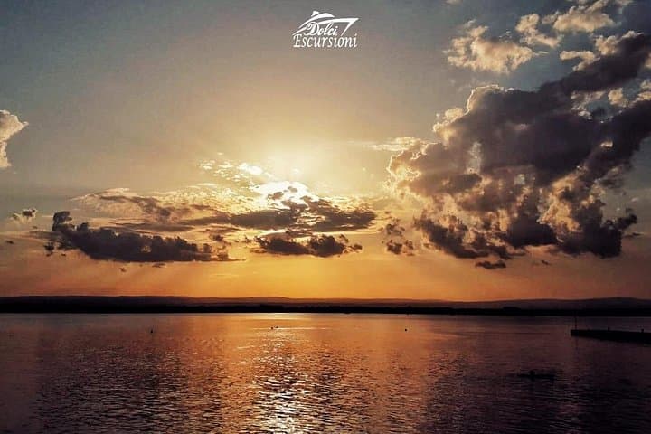 Sunset boat tour with aperitif and swimming break