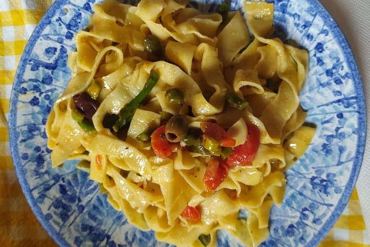 Private and authentic cooking class experience with family
