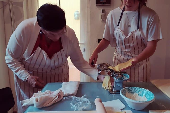 Private and authentic cooking class experience with family