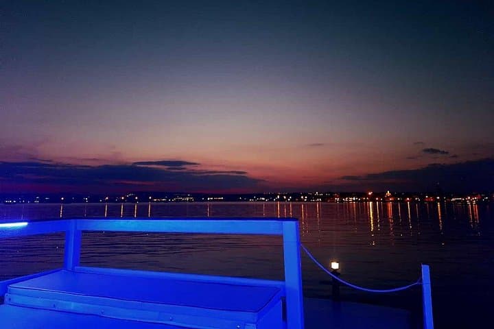 Sunset boat tour with aperitif and swimming break